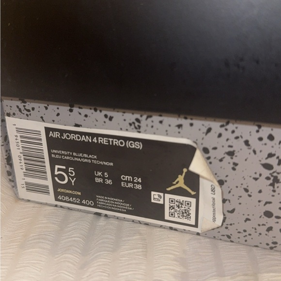 Jordan Air 4 Retro GS - University Blue and Black Sneakers - Picture 1 of 4